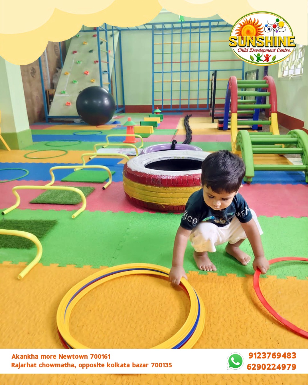 Child developing motor skills in a colourful activity area